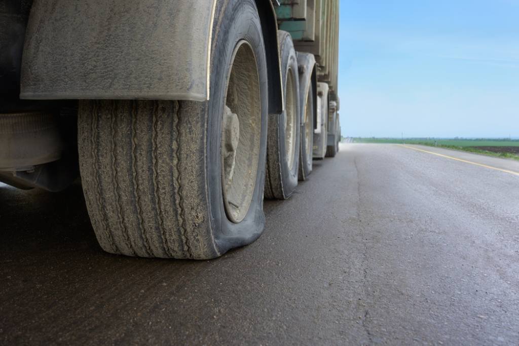 Semi truck on highway with flat tire accident truck crash